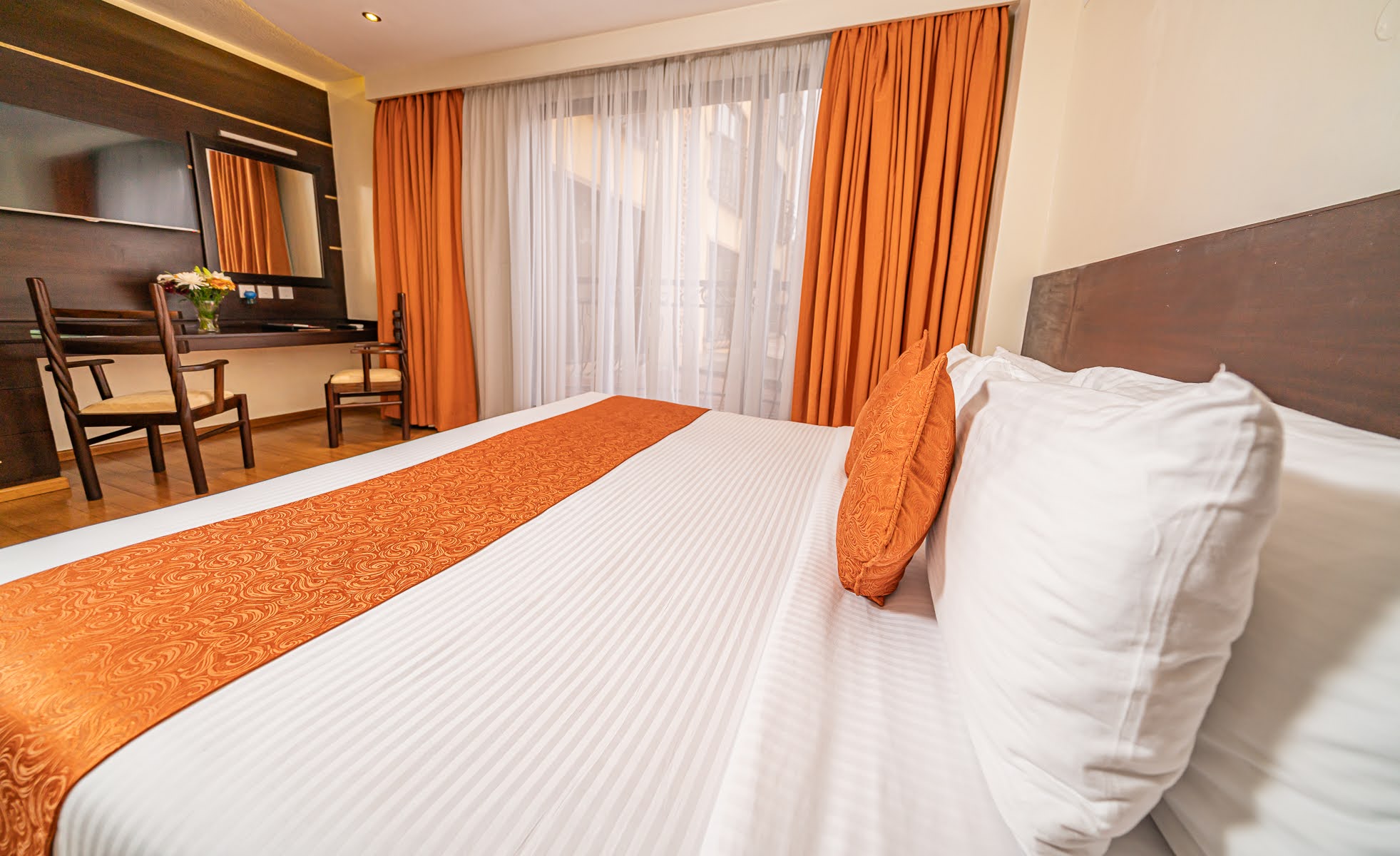 Comfortable guest room at The Monarch Hotel